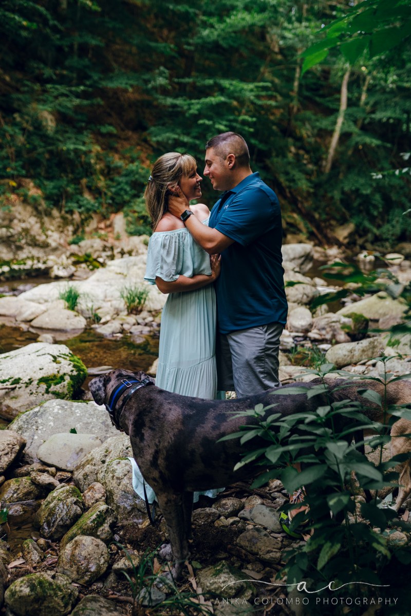Coule embracing in a a riverbed