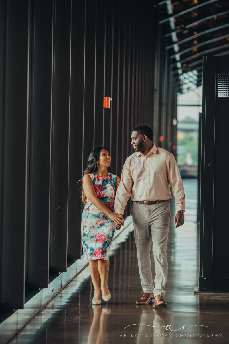 couple strolling hand in hand through mainstreet station in richmond va